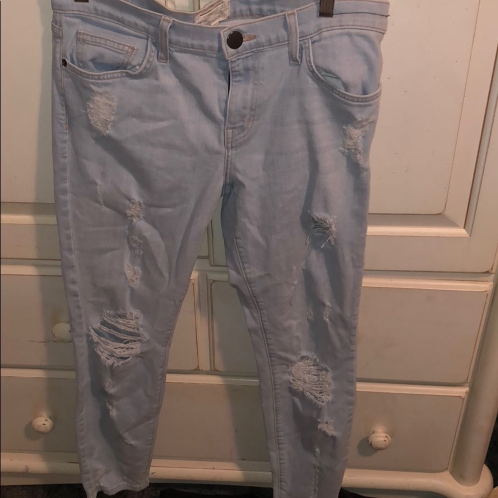 Very lightly worn Blue Ripped Jeans.